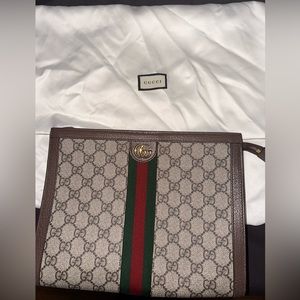 Double G pouch NORMAL WEAR marks at top of pouch and inside lining
